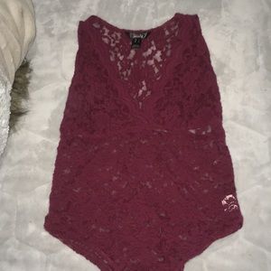 Laced low cut body suit